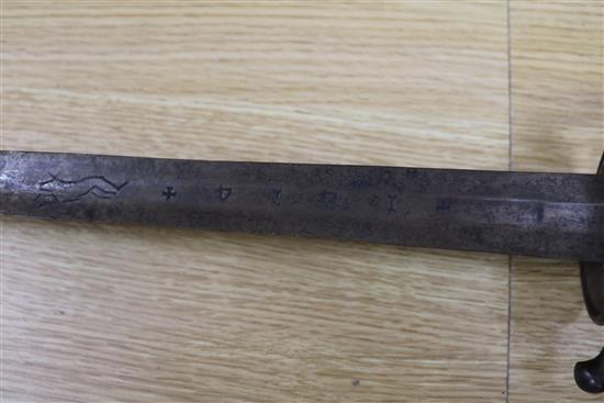 A Turkish sidearm and a cagework hilted sword